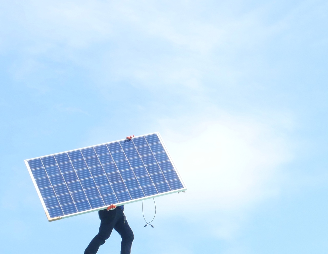 A man carrying a grid tie