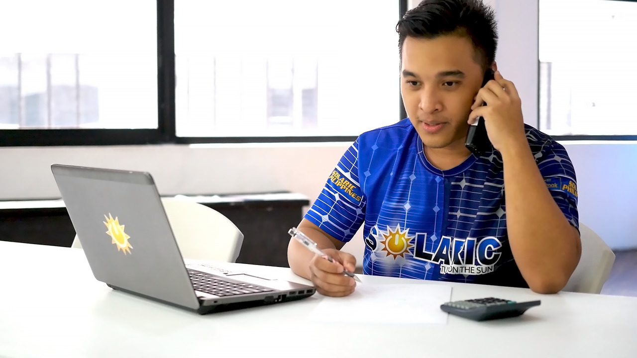 Solaric employee on the phone