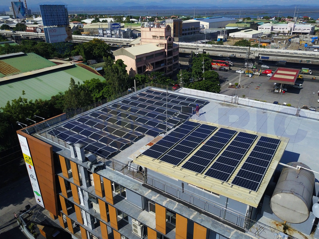 Don Gesu Building in Alabang, Philippines with solar panels on its roof