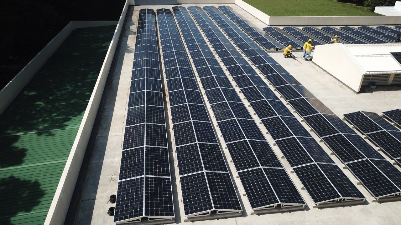 Close up of a rooftop full of solar panels