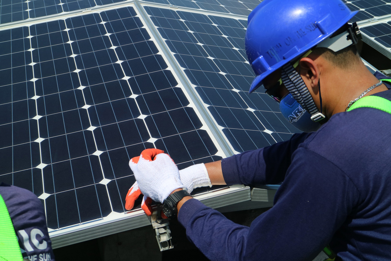 Solar expert installing solar grid