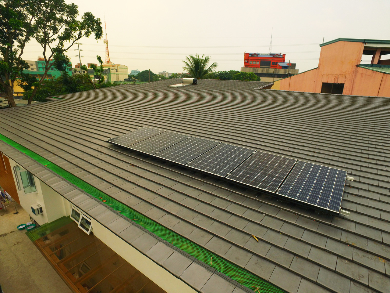Shot of a home's roof with solar panels