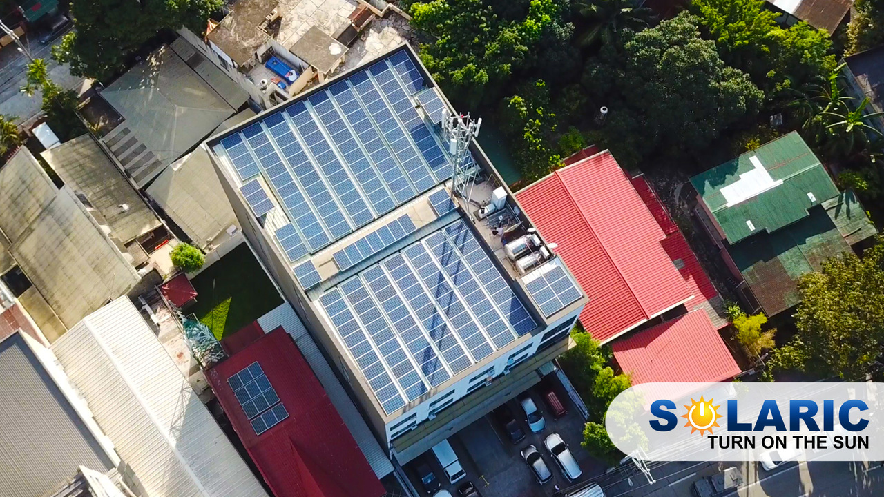 Top shot of a house with rooftop solar panels