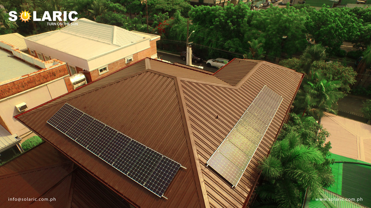 Top view of a house with solar roofing
