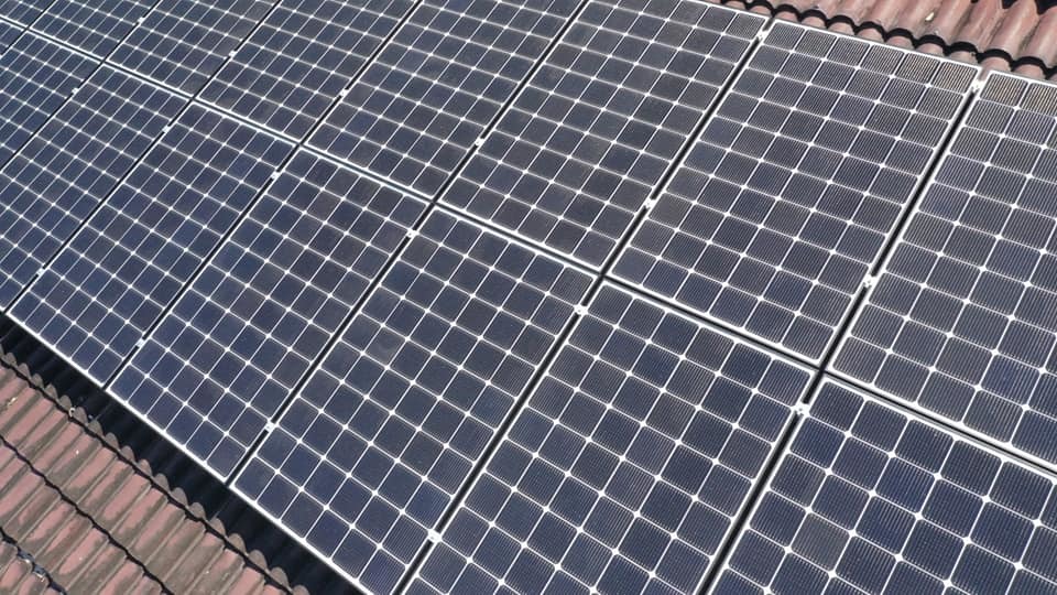 Close-up of a solar panel attached to a roof